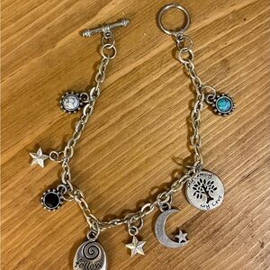 Dainty charm bracelet in silver tone with toggle clasp and 8 charms 7 “